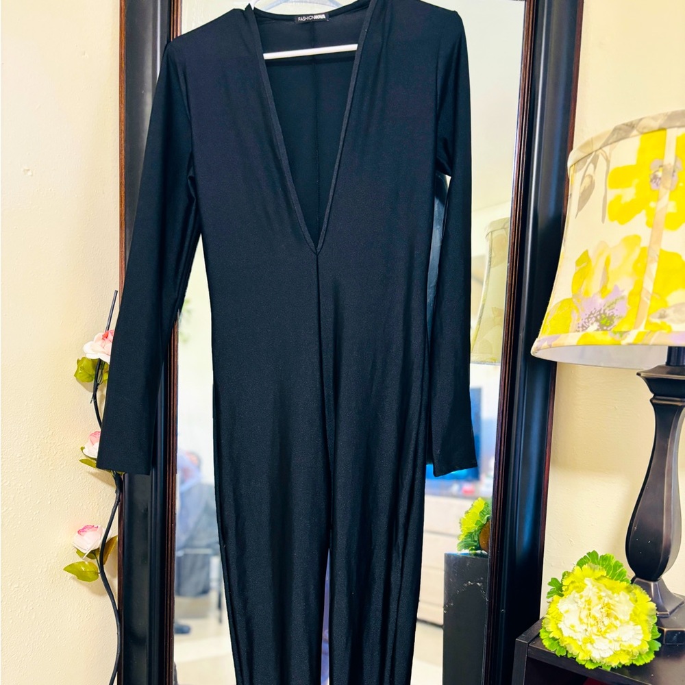 Size Large black jumpsuit worn only once